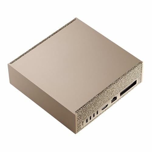 Metallic box with various ports on the side, including USB-C, HDMI, Ethernet, and others.
